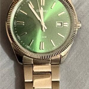 Casio Silver Watch with Green Dial